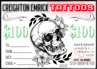 a gift certificate for a tattoo with a skull and flowers